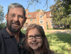 Brigitte Webster stood next to her husband Tom outside their property