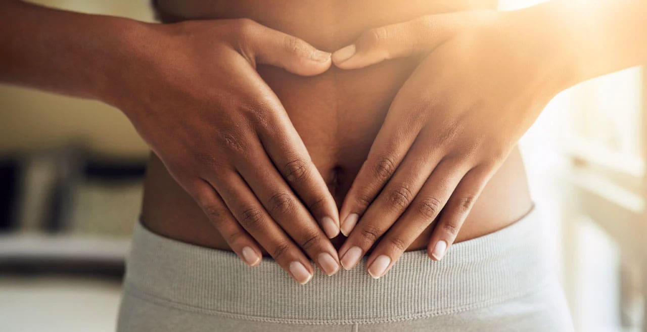 Woman holding her stomach