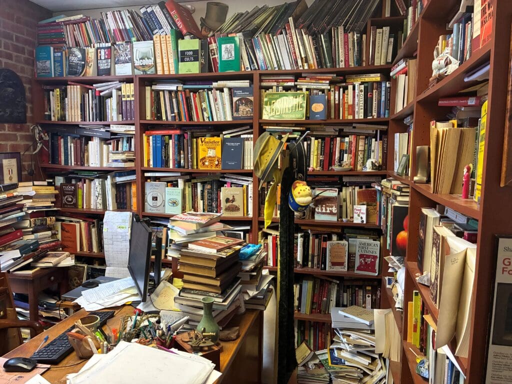 Picture of Ken Albala's office with a lot of books stacked around.
