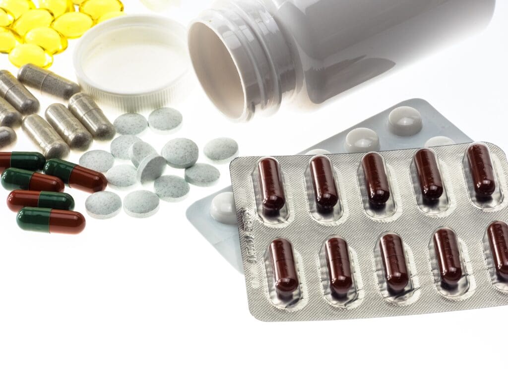 Multiple supplement strips and an empty supplement pot